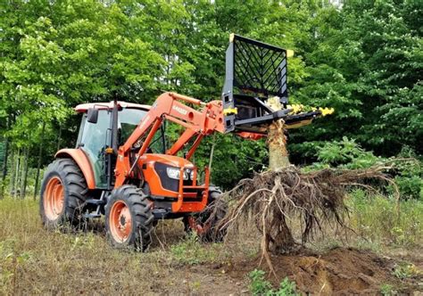 skid steer attachments tree puller|tree puller for compact tractor.